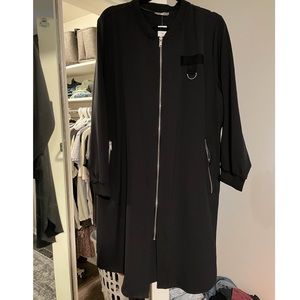 Long black coat with silver details.